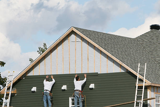 Professional Siding Replacement technician working in Highland Park, TX